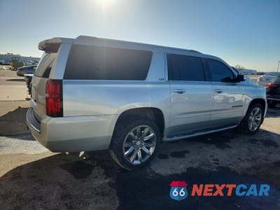 Trzecie zdjęcie samochodu z tyłu: 2015 CHEVROLET SUBURBAN C1500 LTZ VIN:1GNSCKKC0FR550698 - miniatura