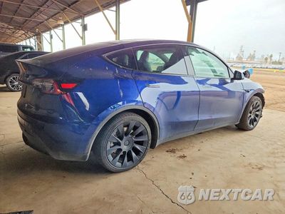 Trzecie zdjęcie samochodu z tyłu: 2023 TESLA MODEL Y VIN:7SAYGAEE8PF797816 - miniatura