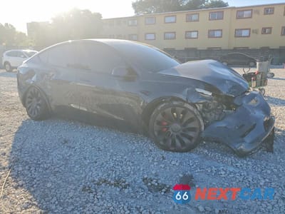 Czwarte zdjęcie samochodu z boku: 2022 TESLA MODEL Y VIN:7SAYGDEF3NF445475 - miniatura