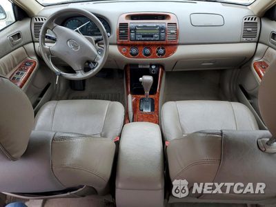 Zdjęcie 8 z 12 samochodu: 2004 TOYOTA CAMRY LE VIN:JTDBE32K740262100 - miniatura