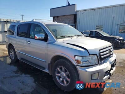 Czwarte zdjęcie samochodu z boku: 2004 INFINITI QX56 BASE VIN:5N3AA08C14N810135 - miniatura