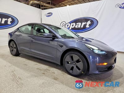 Czwarte zdjęcie samochodu z boku: 2023 TESLA MODEL 3 * RUNS & DRIVES * PRIOR FLEET * VIN:5YJ3E1EA2PF449018 - miniatura