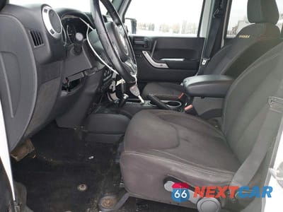 Zdjęcie 7 z 13 samochodu: 2014 JEEP WRANGLER UNLIMITED SAHARA VIN:1C4HJWEG5EL126269 - miniatura