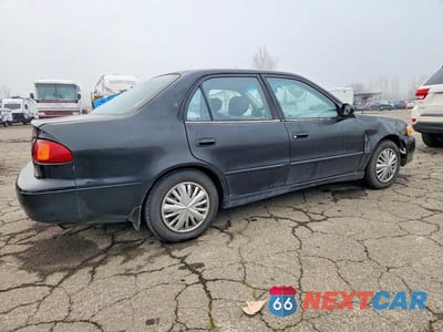 Trzecie zdjęcie samochodu z tyłu: 2002 TOYOTA COROLLA S VIN:1NXBR12E32Z573804 - miniatura