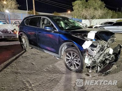Czwarte zdjęcie samochodu z boku: 2021 MAZDA CX-5 GRAND TOURING VIN:JM3KFBDM4M1499988 - miniatura
