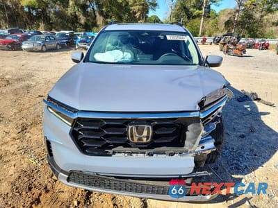 Piąte zdjęcie samochodu w środku: 2024 HONDA PILOT TOURING VIN:5FNYG2H70RB010330 - miniatura