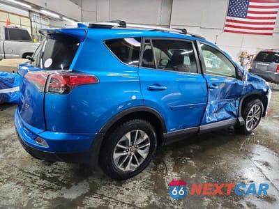 Trzecie zdjęcie samochodu z tyłu: 2018 TOYOTA RAV4 HYBRID XLE VIN:JTMRJREV6JD231721 - miniatura