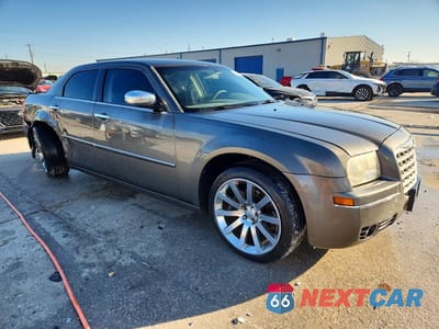 Czwarte zdjęcie samochodu z boku: 2010 CHRYSLER 300 TOURING VIN:2C3CA5CV9AH206630 - miniatura