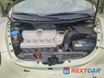 Zdjęcie 11 z 12 samochodu: 2008 VOLKSWAGEN NEW BEETLE CONVERTIBLE S VIN:3VWPG31Y18M417262 - miniatura