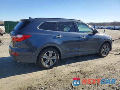 Trzecie zdjęcie samochodu z tyłu: 2016 HYUNDAI SANTA FE SE VIN:KM8SM4HF0GU133952 - miniatura