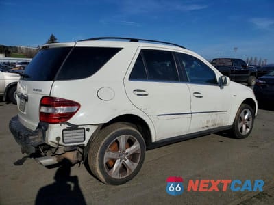 Trzecie zdjęcie samochodu z tyłu: 2010 MERCEDES-BENZ ML 350 BLUETEC VIN:4JGBB2FB6AA612301 - miniatura
