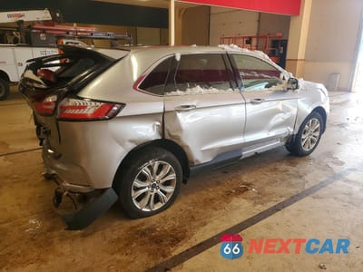 Trzecie zdjęcie samochodu z tyłu: 2022 FORD EDGE TITANIUM VIN:2FMPK4K98NBA14824 - miniatura