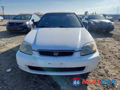 Piąte zdjęcie samochodu w środku: 1997 HONDA CIVIC LX VIN:1HGEJ6676VL036602 - miniatura