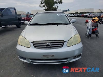 Piąte zdjęcie samochodu w środku: 2003 TOYOTA COROLLA LE VIN:JTDBR32E030021668 - miniatura