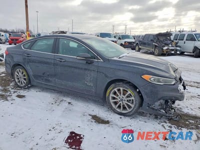 Czwarte zdjęcie samochodu z boku: 2017 FORD FUSION SE PHEV VIN:3FA6P0PU9HR208989 - miniatura