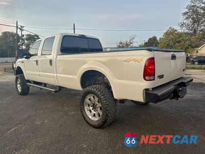 Trzecie zdjęcie samochodu z tyłu: 2004 FORD F350 SRW SUPER DUTY VIN:1FTSW31P74ED34393 - miniatura