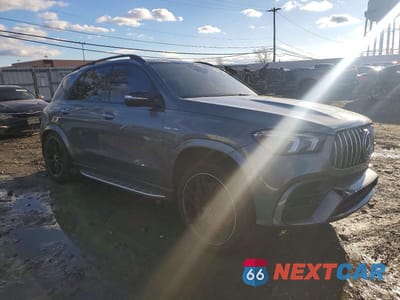 Czwarte zdjęcie samochodu z boku: 2021 MERCEDES-BENZ GLE 63 AMG 4MATIC VIN:4JGFB8KB2MA278539 - miniatura