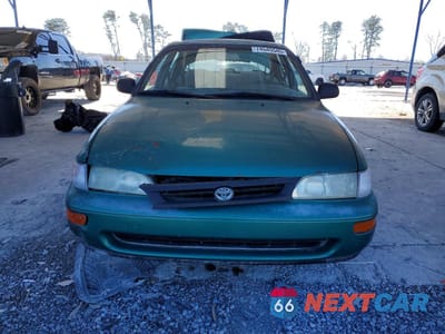 Piąte zdjęcie samochodu w środku: 1997 TOYOTA COROLLA DX VIN:1NXBB02E2VZ505125 - miniatura