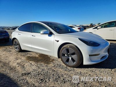 Czwarte zdjęcie samochodu z boku: 2023 TESLA MODEL 3 VIN:5YJ3E1EA7PF599738 - miniatura