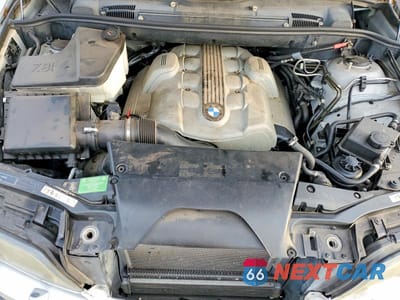 Zdjęcie 12 z 13 samochodu: 2005 BMW X5 4.8IS VIN:5UXFA93505LE83452 - miniatura