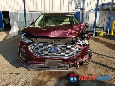 Piąte zdjęcie samochodu w środku: 2021 FORD EDGE TITANIUM VIN:2FMPK4K93MBA18116 - miniatura