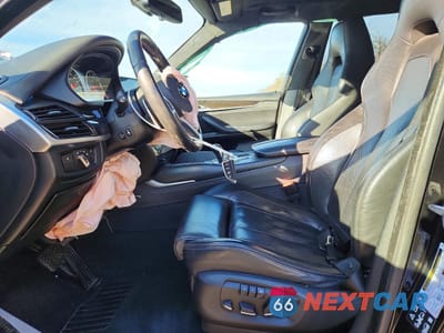 Zdjęcie 7 z 14 samochodu: 2018 BMW X5 M VIN:5YMKT6C57J0X21323 - miniatura