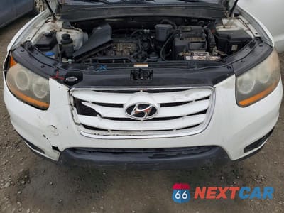 Zdjęcie 12 z 12 samochodu: 2010 HYUNDAI SANTA FE VIN:5NMSH4AG0AH355689 - miniatura