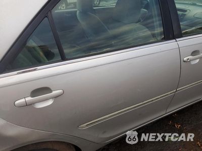 Zdjęcie 10 z 13 samochodu: 2003 TOYOTA CAMRY LE VIN:4T1BE30K13U727878 - miniatura
