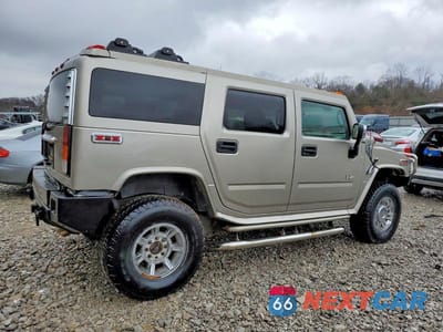 Trzecie zdjęcie samochodu z tyłu: 2004 HUMMER H2 VIN:5GRGN23U04H102723 - miniatura