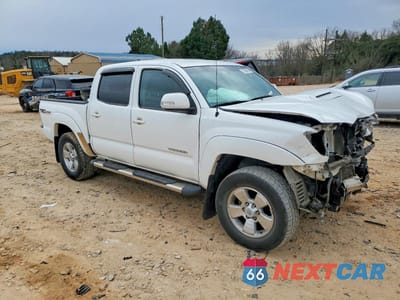 Czwarte zdjęcie samochodu z boku: 2014 TOYOTA TACOMA V6 VIN:5TFLU4EN7EX085270 - miniatura