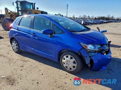 Czwarte zdjęcie samochodu z boku: 2015 HONDA FIT LX VIN:3HGGK5H58FM756219 - miniatura