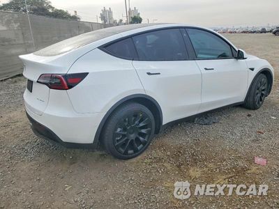 Trzecie zdjęcie samochodu z tyłu: 2021 TESLA MODEL Y VIN:5YJYGDEE4MF158570 - miniatura