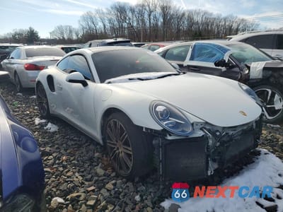 Czwarte zdjęcie samochodu z boku: 2015 PORSCHE 911 TURBO VIN:WP0AD2A92FS166227 - miniatura