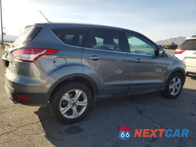 Trzecie zdjęcie samochodu z tyłu: 2014 FORD ESCAPE SE VIN:1FMCU9G93EUE00561 - miniatura