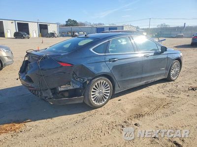 Trzecie zdjęcie samochodu z tyłu: 2014 FORD FUSION TITANIUM HEV VIN:3FA6P0RU3ER285494 - miniatura
