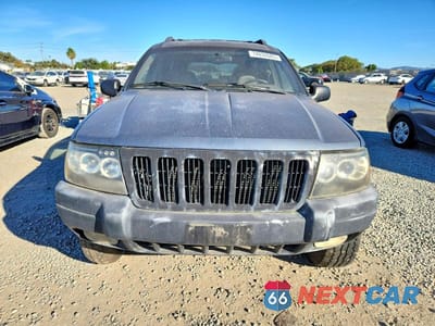 Piąte zdjęcie samochodu w środku: 2001 JEEP GRAND CHEROKEE LAREDO VIN:1J4GW48S91C671624 - miniatura