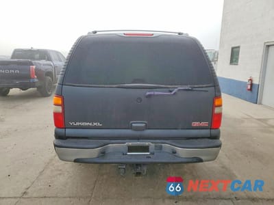 Zdjęcie 6 z 12 samochodu: 2004 GMC YUKON XL VIN:1GKFK66U64J275572 - miniatura