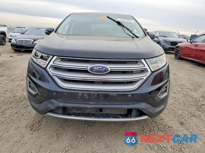 Piąte zdjęcie samochodu w środku: 2017 FORD EDGE TITANIUM VIN:2FMPK3K95HBB21070 - miniatura