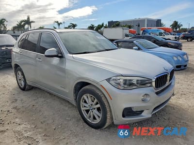 Czwarte zdjęcie samochodu z boku: 2014 BMW X5 SDRIVE35I VIN:5UXKR2C52E0H32429 - miniatura
