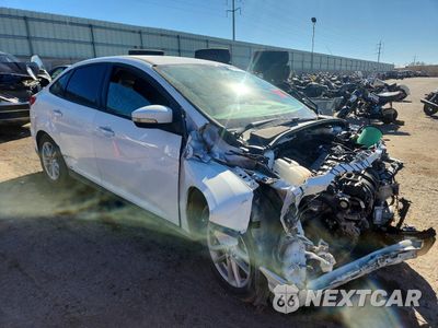 Czwarte zdjęcie samochodu z boku: 2017 FORD FOCUS SE VIN:1FADP3F20HL320152 - miniatura