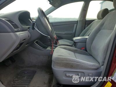 Zdjęcie 7 z 11 samochodu: 2004 TOYOTA CAMRY LE VIN:4T1BF30K04U077830 - miniatura