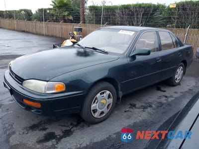 1995 TOYOTA CAMRY LE JT2GK12E1S0124877 - główne zdjęcie licytacji z USA - miniatura