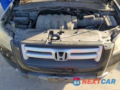 Zdjęcie 11 z 12 samochodu: 2007 HONDA PILOT LX VIN:5FNYF18127B018936 - miniatura