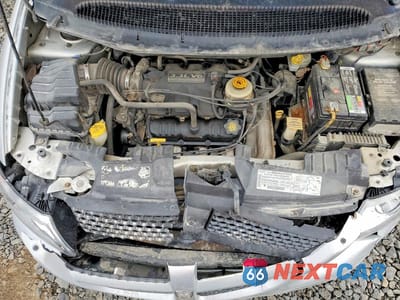Zdjęcie 12 z 13 samochodu: 2002 DODGE GRAND CARAVAN SPORT VIN:1B4GP44332B689171 - miniatura