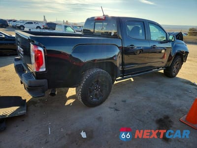 Trzecie zdjęcie samochodu z tyłu: 2022 GMC CANYON AT4 VIN:1GTG6FEN0N1289936 - miniatura