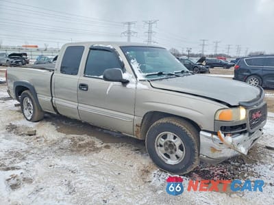 Czwarte zdjęcie samochodu z boku: 1999 GMC NEW SIERRA C1500 VIN:1GTEC19T7XZ537275 - miniatura