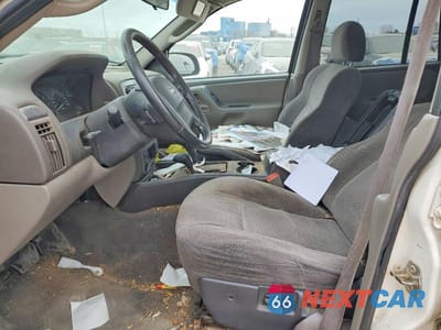 Zdjęcie 7 z 13 samochodu: 2004 JEEP GRAND CHEROKEE LAREDO VIN:1J4GW48S24C350027 - miniatura