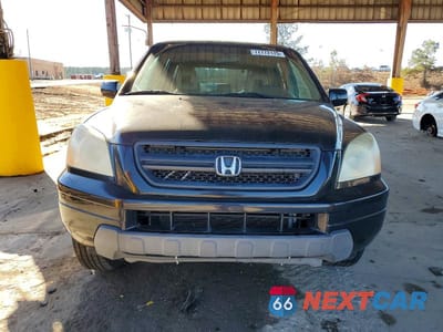 Piąte zdjęcie samochodu w środku: 2004 HONDA PILOT EXL VIN:2HKYF18664H572490 - miniatura