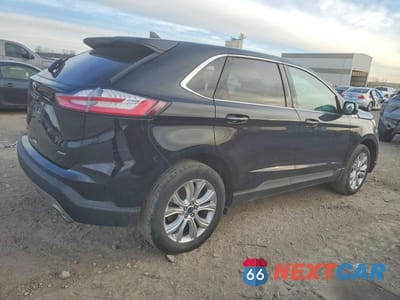 Trzecie zdjęcie samochodu z tyłu: 2022 FORD EDGE TITANIUM VIN:2FMPK4K98NBA45507 - miniatura