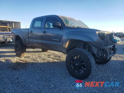 Czwarte zdjęcie samochodu z boku: 2010 TOYOTA TACOMA V6 VIN:3TMMU4FN0AM023048 - miniatura